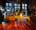 Stage area with dramatic lighting and historic architecture